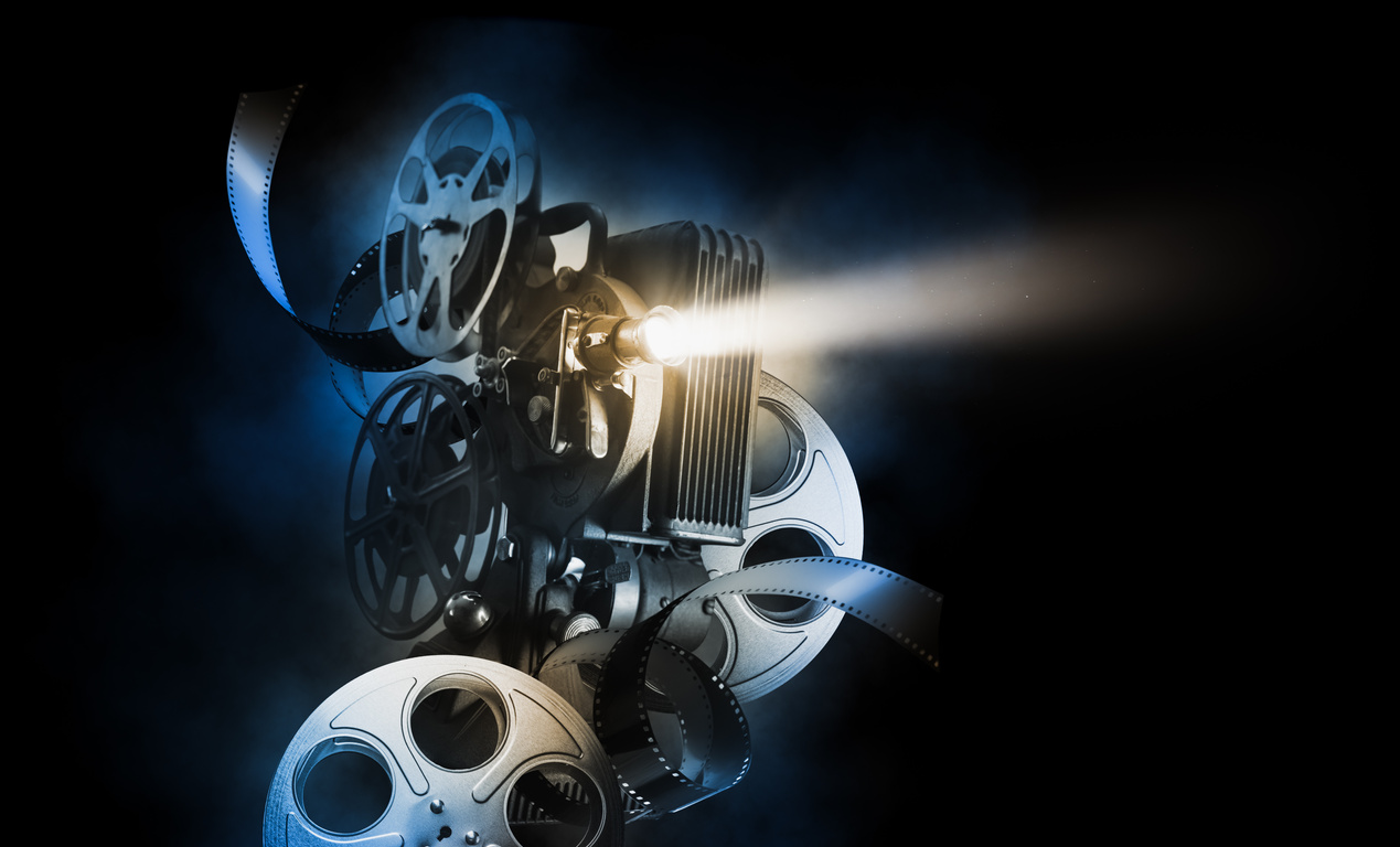 Movie projector on movie background